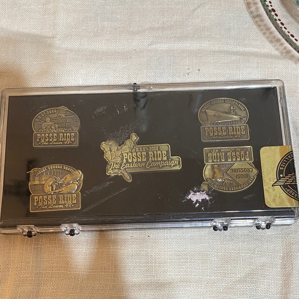 Never opened.2005 Harley Davidson Posse Ride Pin Collection
